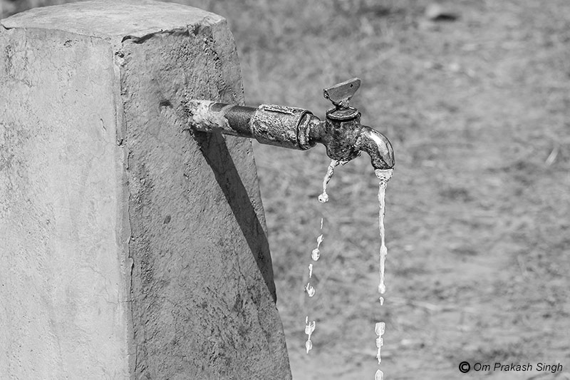 A leaking Jal Jeevan Mission FHTC that blatantly wastes valuable water resources during the supply hours in Seraikela-Kharsawan district Jharkhand, India